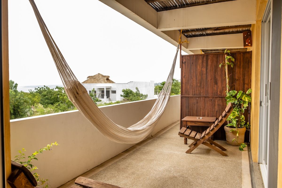 Terraza privada con hamaca